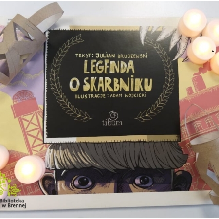 Fotografia kolorowa. Strona tytułowa wspaniałej legendy o Skarbniku. 